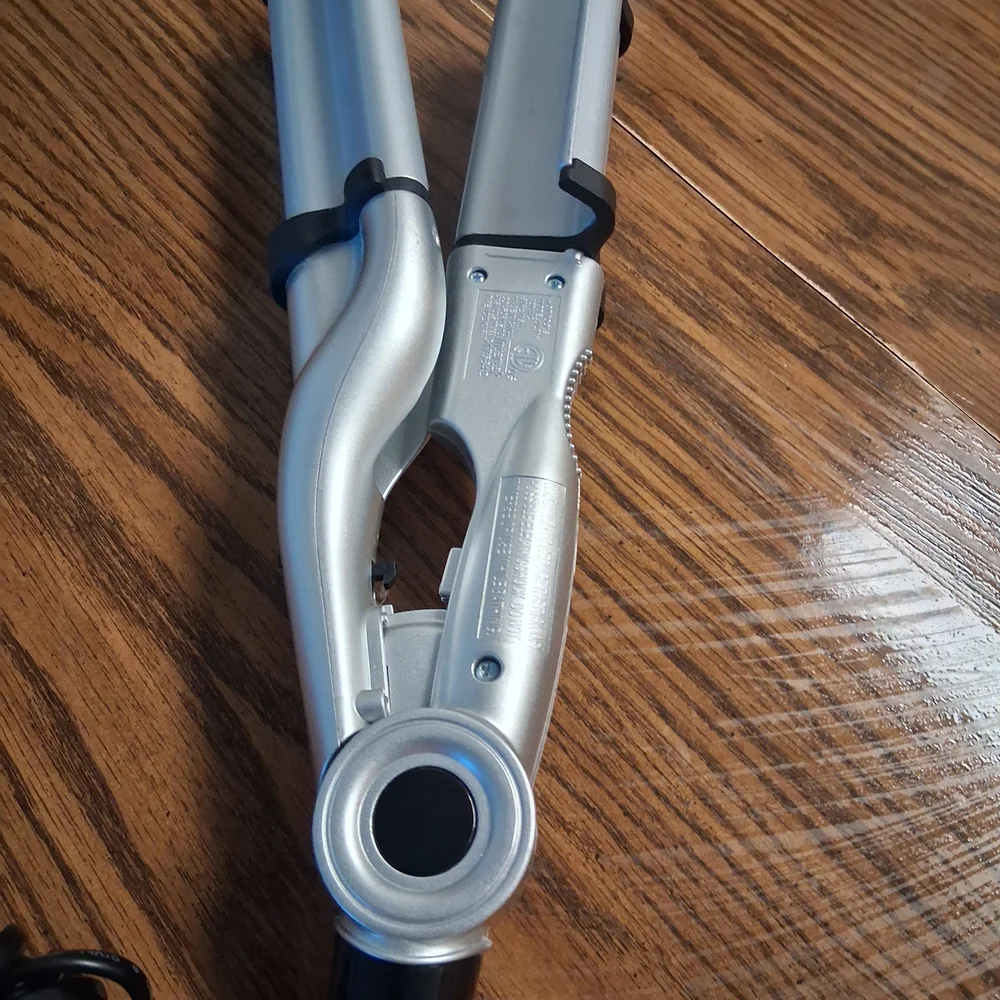 Sleek Silver Hair Styling Tool